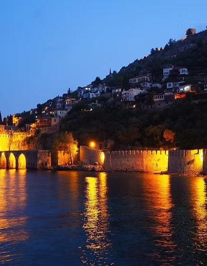 Alanya castle walls lit at night above the sea | Allergy Treatment in Tosmur | Online Doctor & Online Prescription | E-rx.online