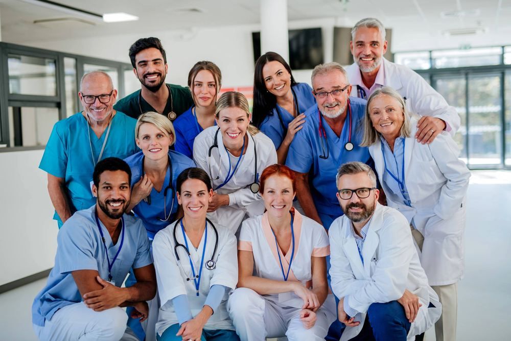 Smiling hospital medical team group portrait | Aydin and Kusadasi Traveller Health Guide | Online Doctor | E-rx.online